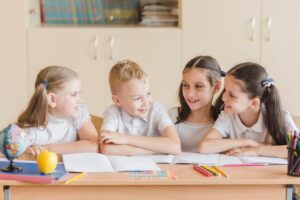 cheerful-kids-chatting-lesson_23-2147848670